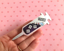 Load image into Gallery viewer, VAXXED Syringe Brooch in silver and Purple Glimmer
