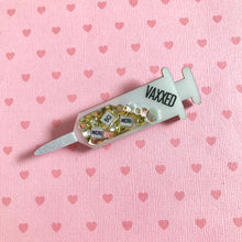 Load image into Gallery viewer, VAXXED Syringe Brooches in silver and gold glitter
