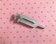 Load image into Gallery viewer, VAXXED Syringe Brooches in Silver and Pink Glitter
